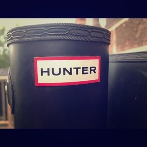 Tall black Hunter boots in decent condition.